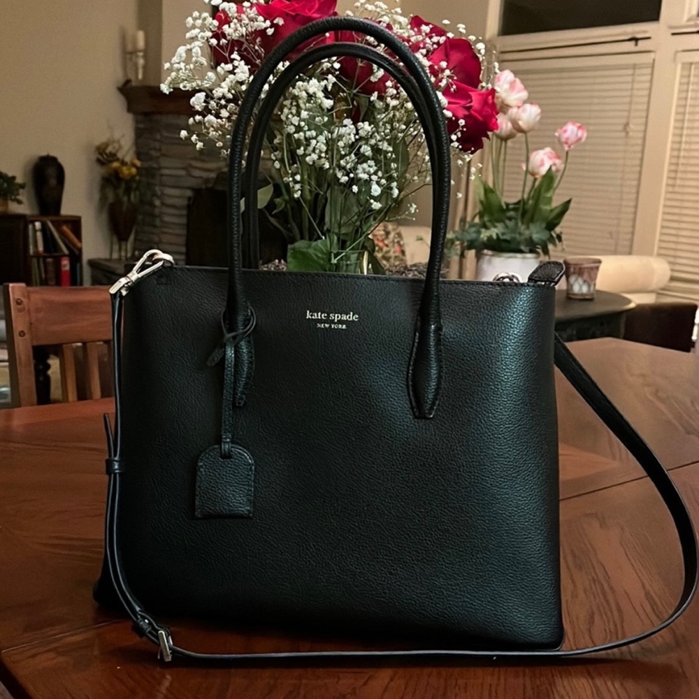 Beautiful Kate Spade purse never carried. Copied from previous listing.